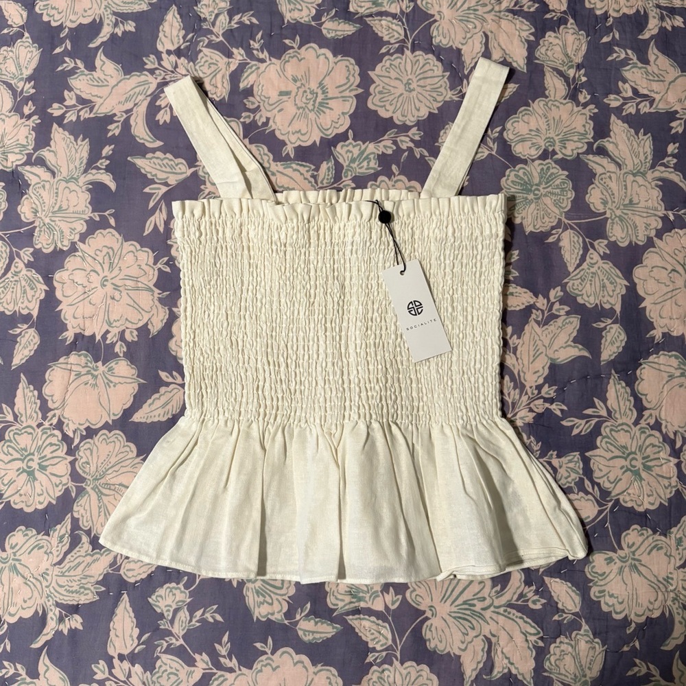 Socialite Ivory Smocked Peplum Top